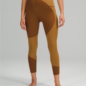 Lululemon Nulu color block high rise leggings Sz 8